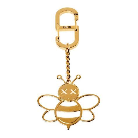 dior x kaws bee charm|DIOR x KAWS Bee Bag Charm – Collections Couture.